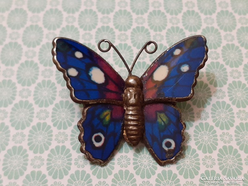 Retro enamel brooch with butterfly shaped badge