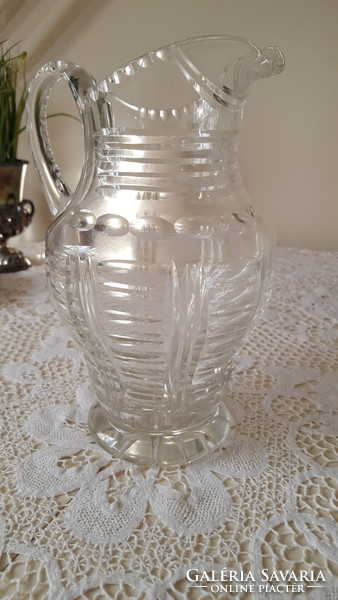Old, engraved thick crystal water jug