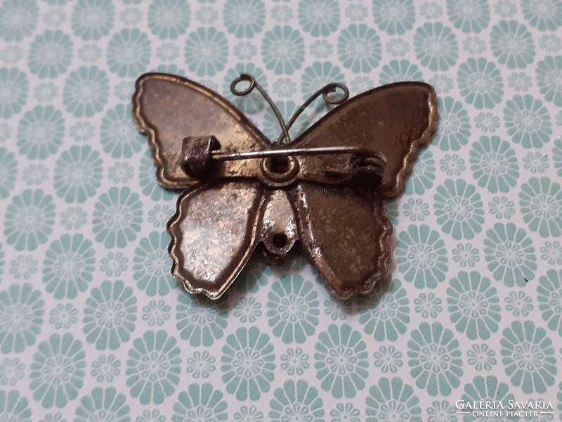 Retro enamel brooch with butterfly shaped badge