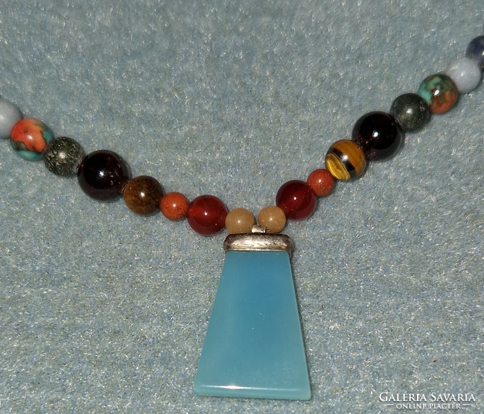 Healing chakra necklaces with blue chalcedony pendants and many precious stones