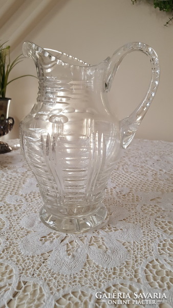 Old, engraved thick crystal water jug