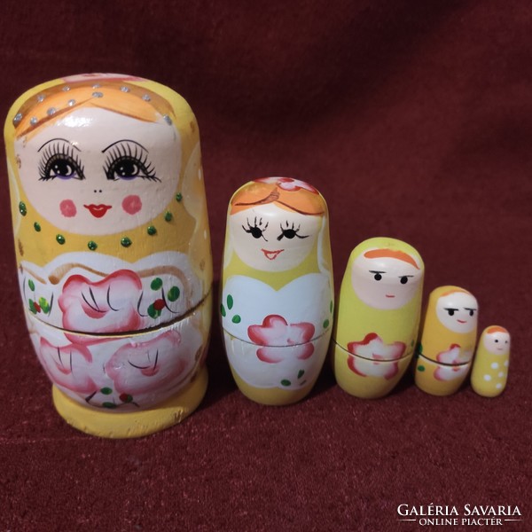 5-piece wooden doll toy resembling Matryoshka dolls