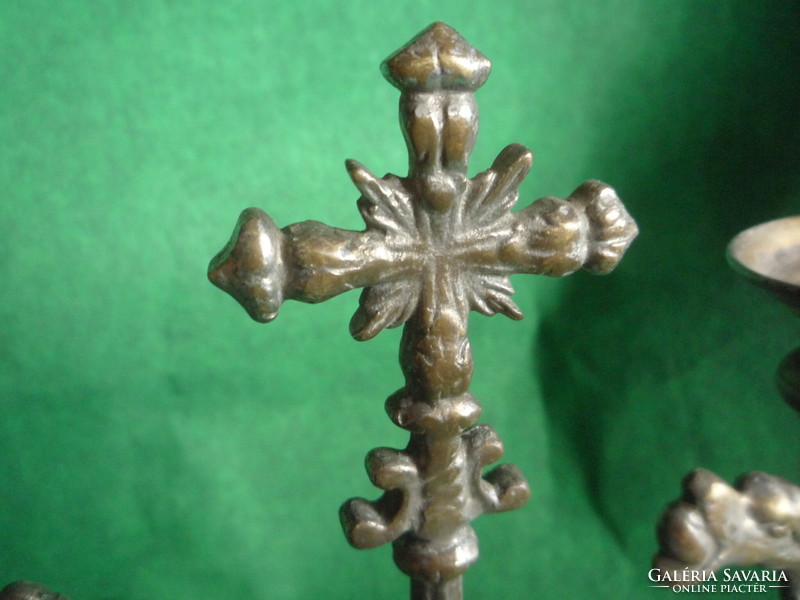 Candle holder with cross.