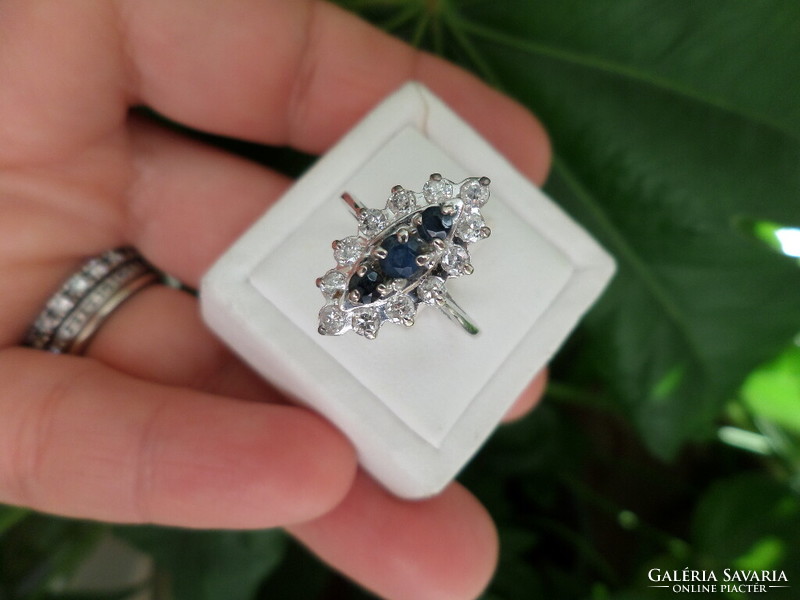 White gold ring with sapphires and brilliants