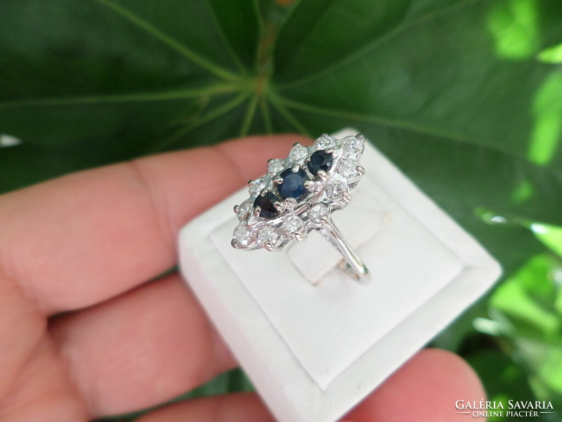 White gold ring with sapphires and brilliants