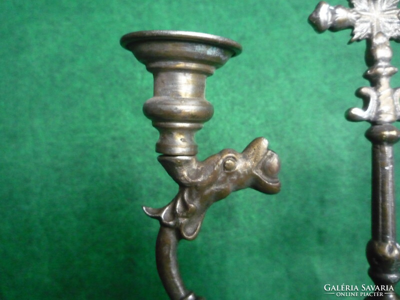 Candle holder with cross.