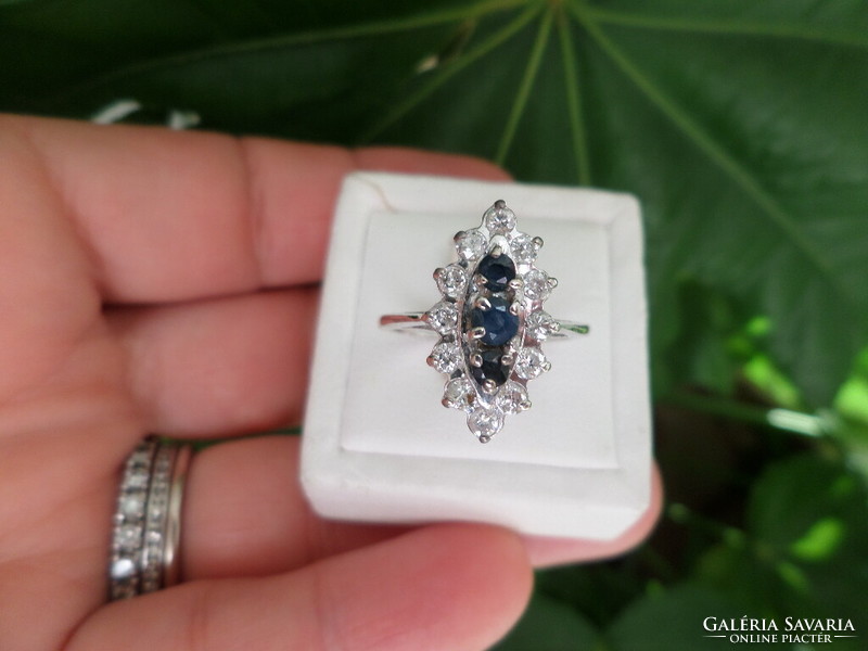 White gold ring with sapphires and brilliants