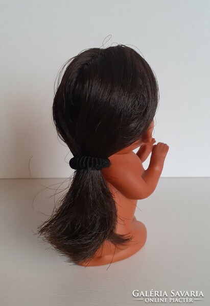 Old rare gesturing rubber doll with braided hair