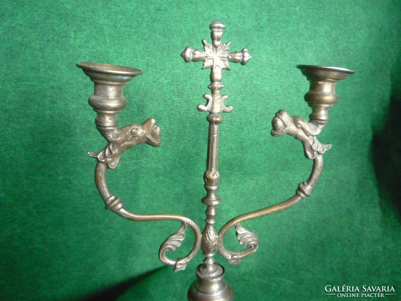 Candle holder with cross.