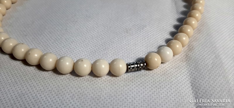 Vintage bone effect plastic string of beads
