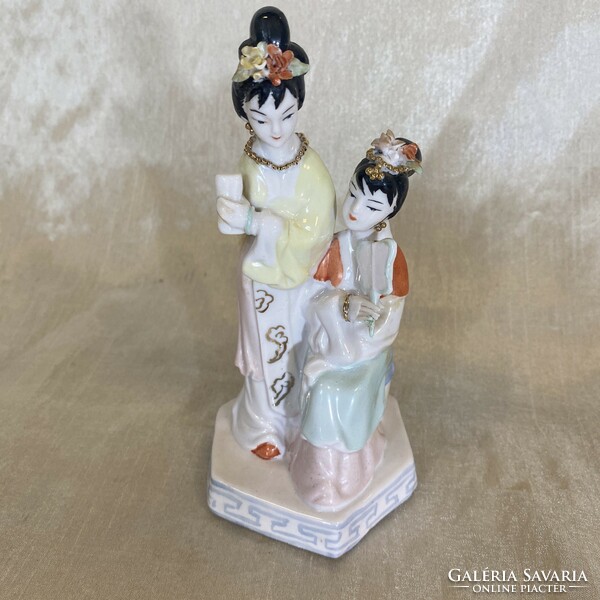 Antique Chinese porcelain statue