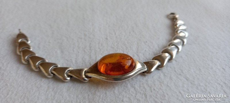 Silver bracelet with amber stones