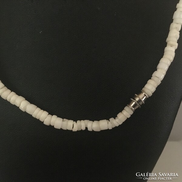 String of pearls-carved from shell discs, with lava grains-