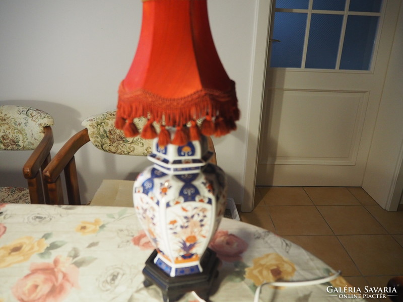 A table lamp with an Imari style porcelain body