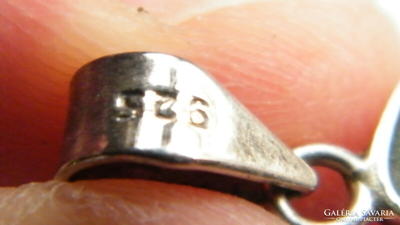 Rubi zoisite pendant, in a silver socket.