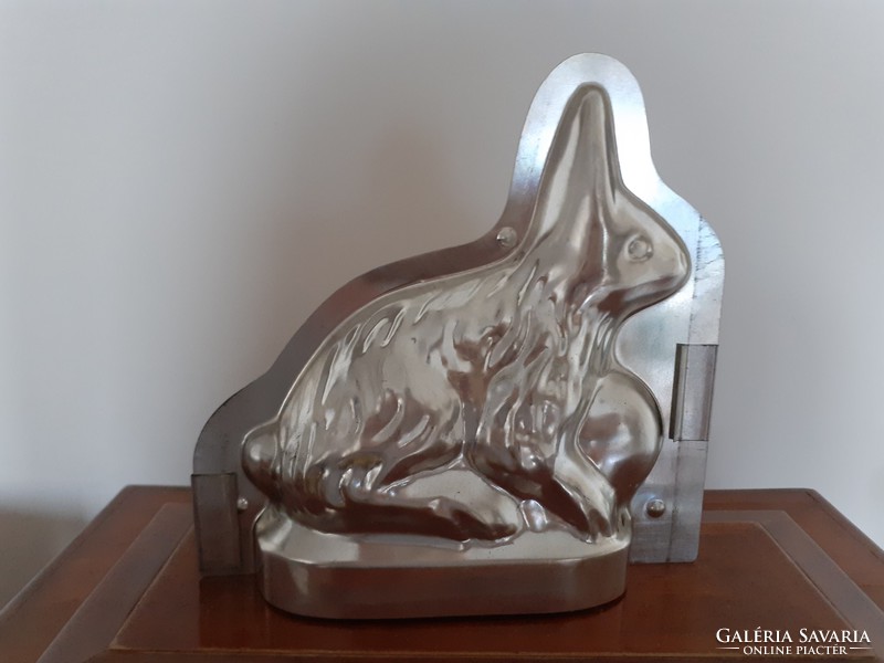 Retro Easter bunny baking dish with old rabbit shape metal cake baking chocolate mold