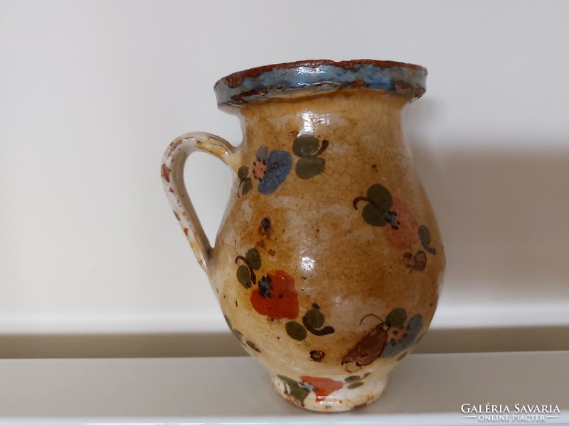 Old glazed tile jar with floral folk little jam bastard