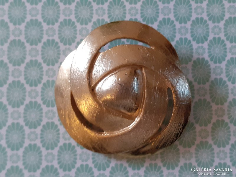 Retro metal brooch with old female badge