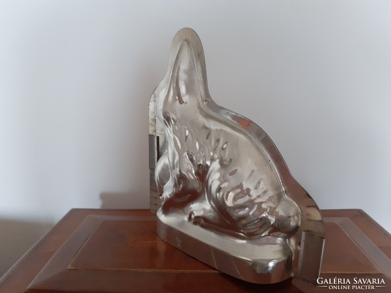 Retro Easter bunny baking dish with old rabbit shape metal cake baking chocolate mold