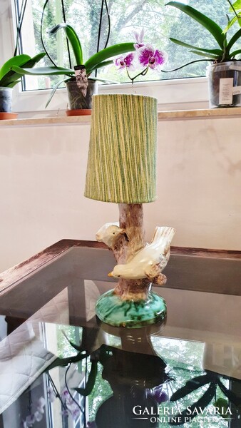 Old, bird-like, ceramic table lamp, assembled, with a greenish, mottled shade, complete. (4.)