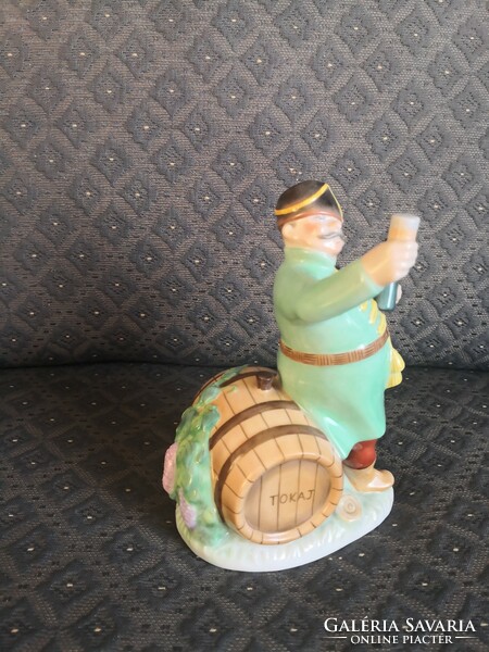 Herend Tokaj winemaker. Tibor Pólya: drinking man with a barrel