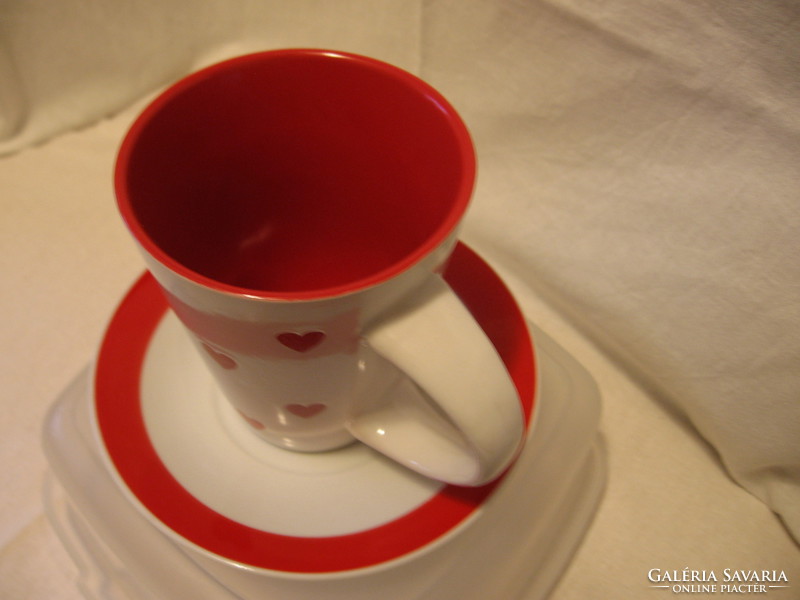 Heart-shaped ceramic mug with red interior, also for Valentine's Day
