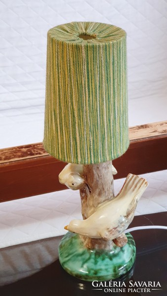 Old, bird-like, ceramic table lamp, assembled, with a greenish, mottled shade, complete. (4.)