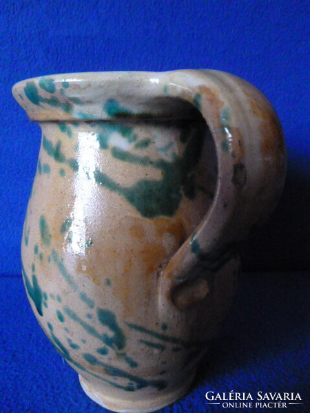 Ceramic spout.