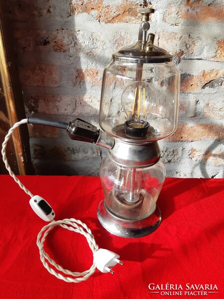 A lamp made from a unique flask coffee maker
