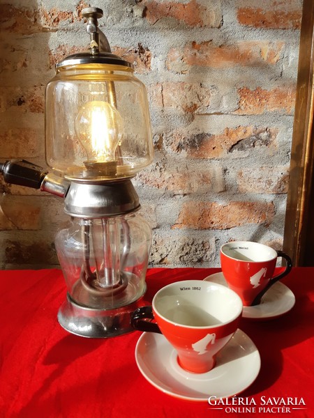 A lamp made from a unique flask coffee maker