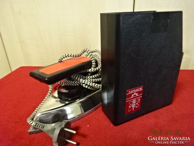 Russian travel iron, in a plastic holder, the length of the ironing board is 16.5 cm. Jokai.