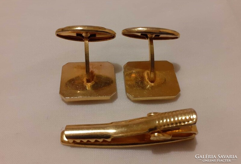 Elegant mother-of-pearl cufflink with matching tie clip