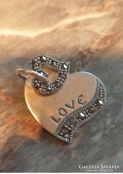 Marked silver heart with marcasite stone. Silver pendant