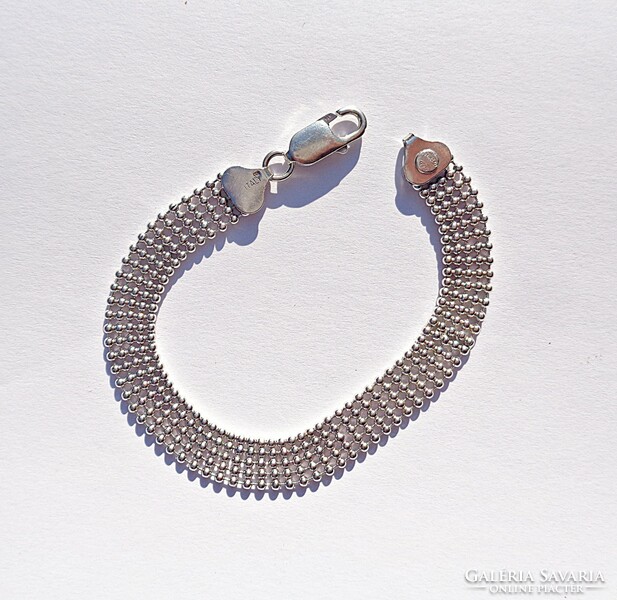 19 cm long, 9 mm. Wide Italian silver bracelet