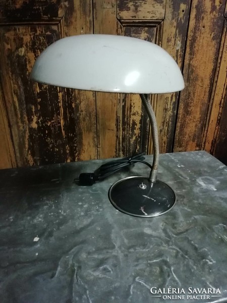 Desk lamp, from the 1950s and 60s, I think it is a deer lamp, laryngeal patina lamp, Kaiser style