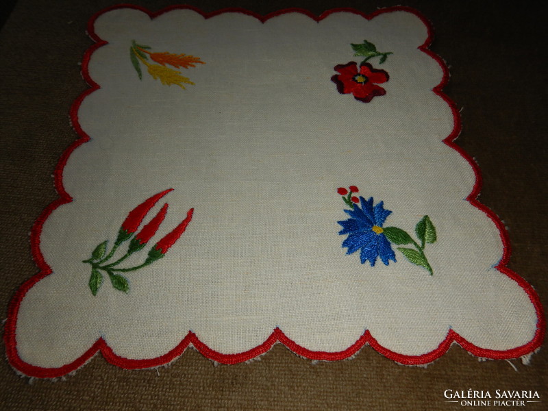 Embroidered tablecloth and placemats