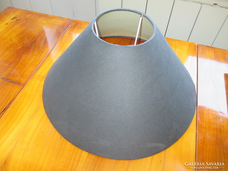 Black, bone-colored inside, table lamp shade that directs the light flawlessly