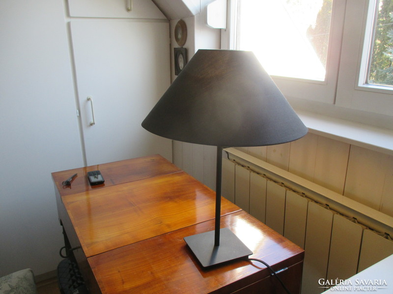 Black, bone-colored inside, table lamp shade that directs the light flawlessly