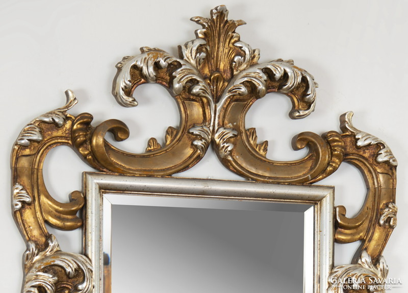 Carved wooden mirror with stylized tendril decor (gilded and silver-plated)