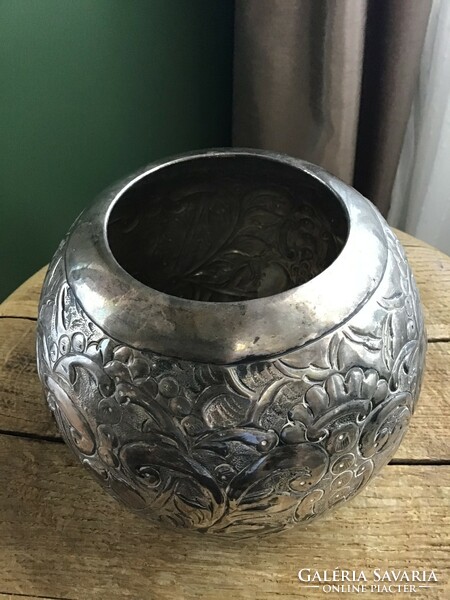 Old silver colored metal vase