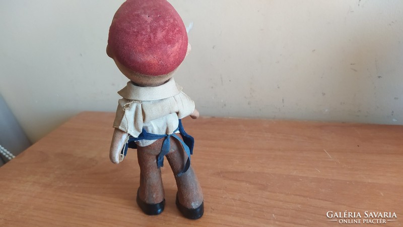 (K) antique toy figure. From material unknown to me.