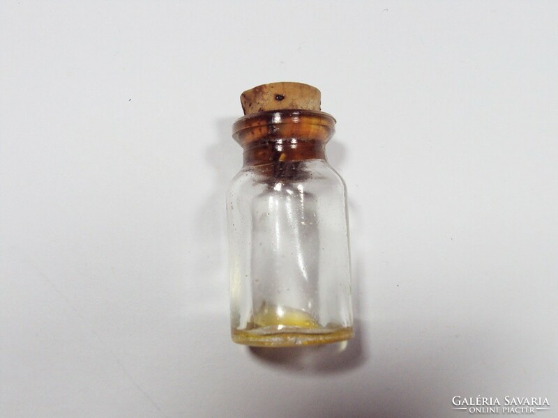 Old retro mini glass bottle with cork stopper 4 cm high