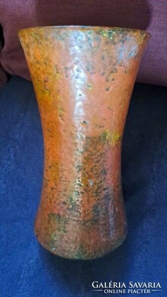 An industrial artist's glazed vase