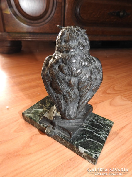 Bronze owl on a marble plinth