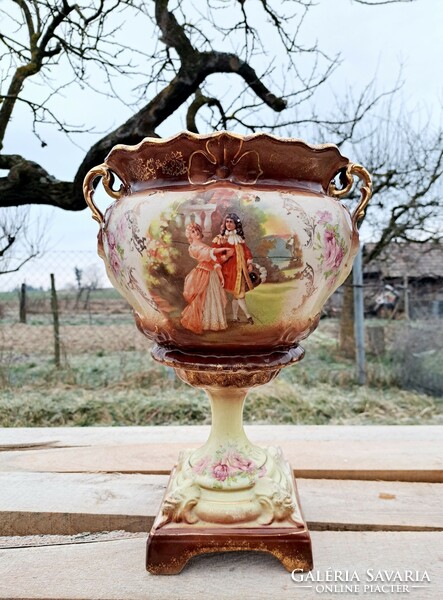 A beautiful antique footed casket with a scene