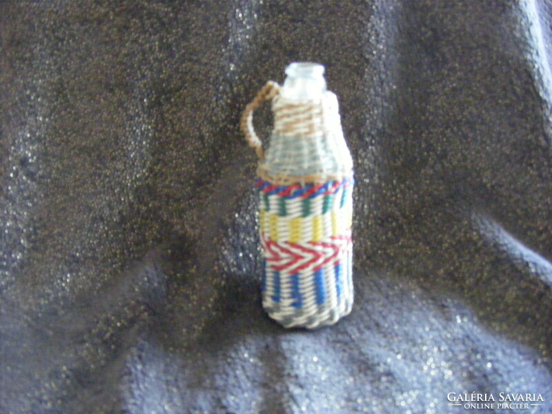 Old, retro woven mini drinking bottle