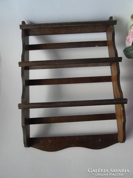 Wooden shelf for collections and small things.