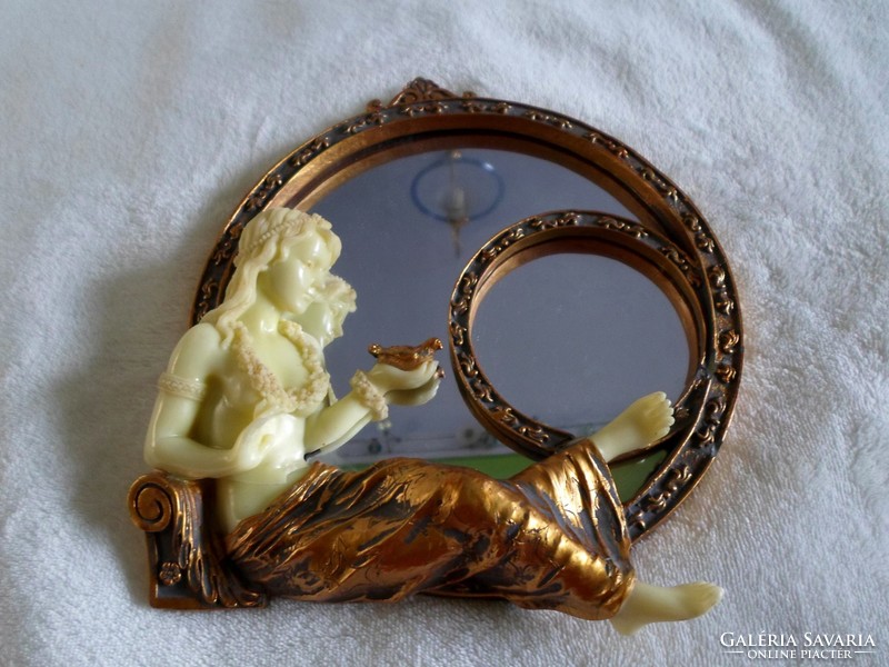 Art Nouveau style wall mirror with a female figure