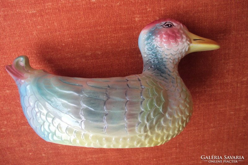 Colorfully painted porcelain serving bowl imitating the shape of a duck.