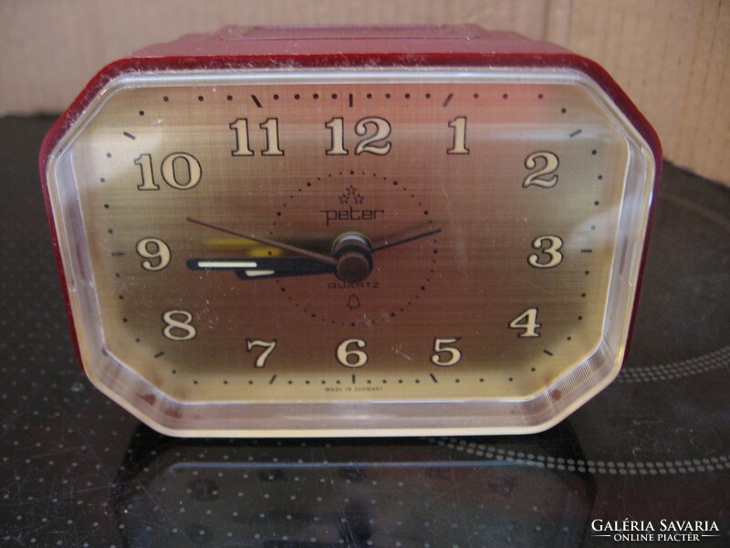 Retro burgundy plastic alarm clock
